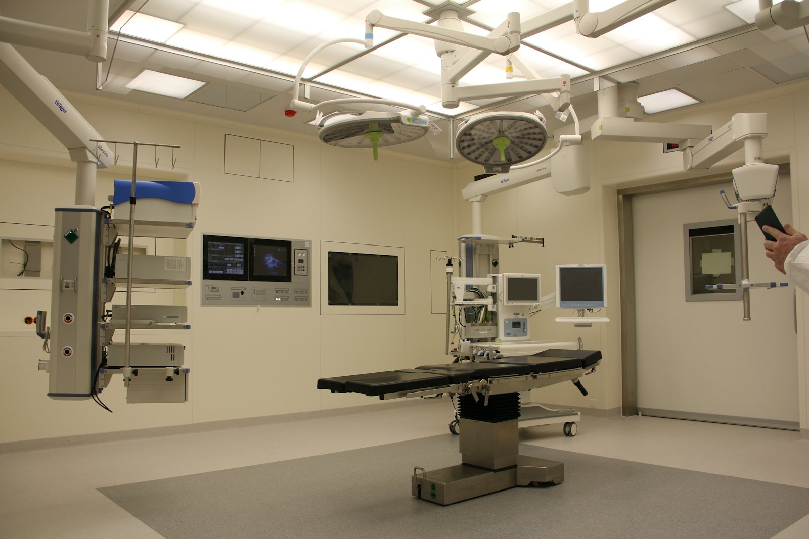 Diagnostic and surgical equipment inside a modern hospital suite